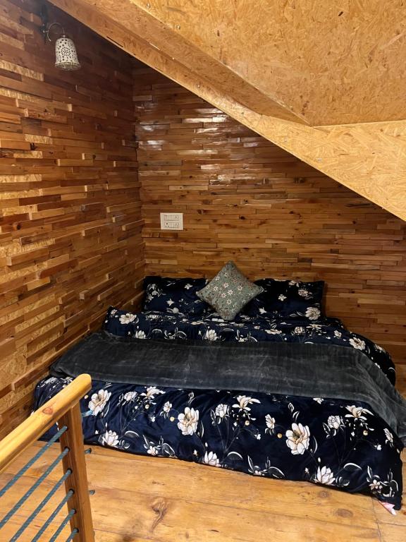 Postel nebo postele na pokoji v ubytování Pahadi House