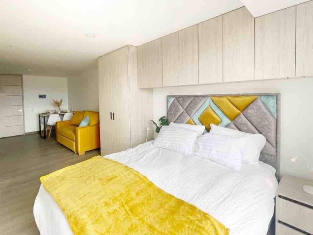 Cama o camas de una habitación en Apartment in the heart of Bogotá