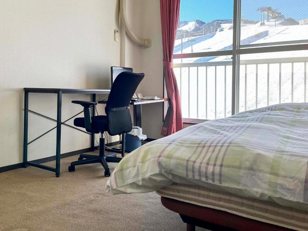 Säng eller sängar i ett rum på Ishiuchi Ski Center - Vacation STAY 09176v