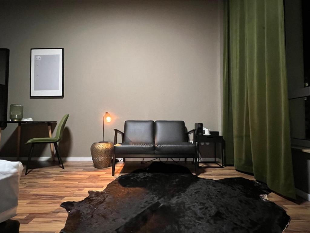 Posezení v ubytování N8 ROOMS - by Leipzig Suites