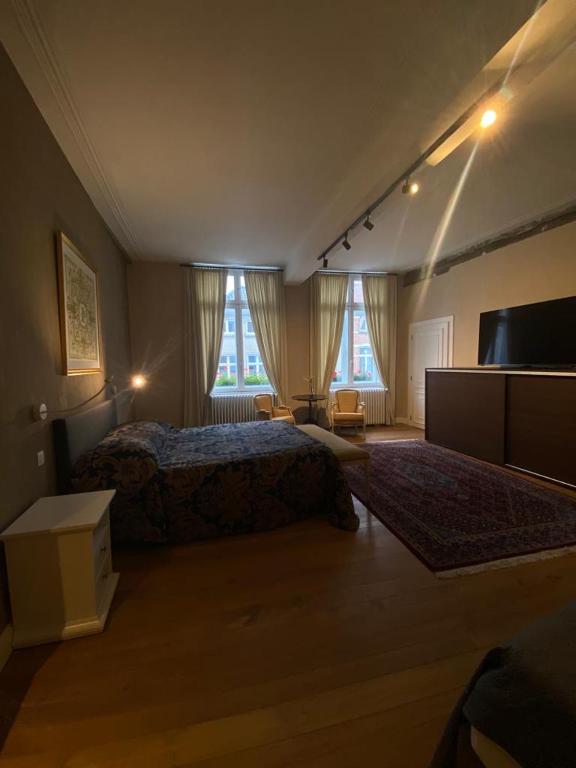 Postel nebo postele na pokoji v ubytování Guesthouse 1640