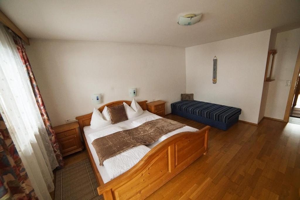 Postel nebo postele na pokoji v ubytování Oberstockachhof