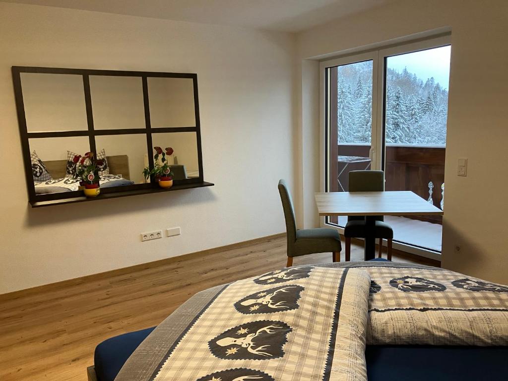 Postel nebo postele na pokoji v ubytování Mahdgut