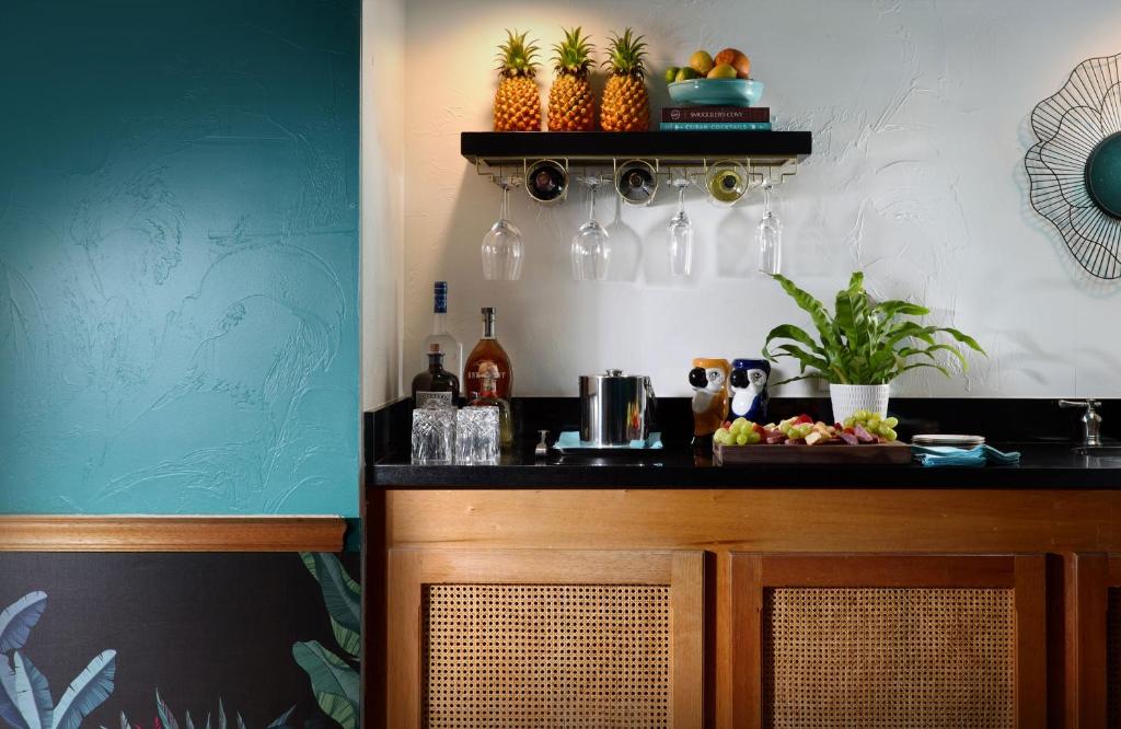 a kitchen with a counter with fruit on it at Ocean Key Resort & Spa, a Noble House Resort in Key West