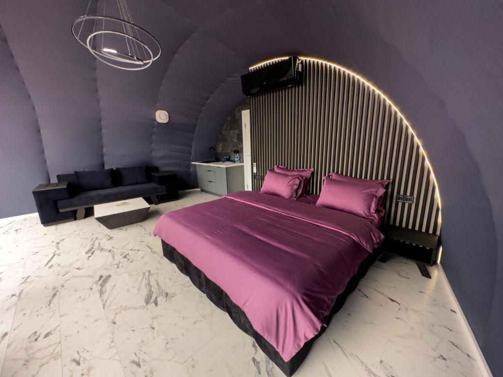 Postel nebo postele na pokoji v ubytování Wellland Hotel