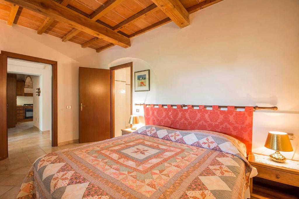 Postel nebo postele na pokoji v ubytování Le Valli Tuscany