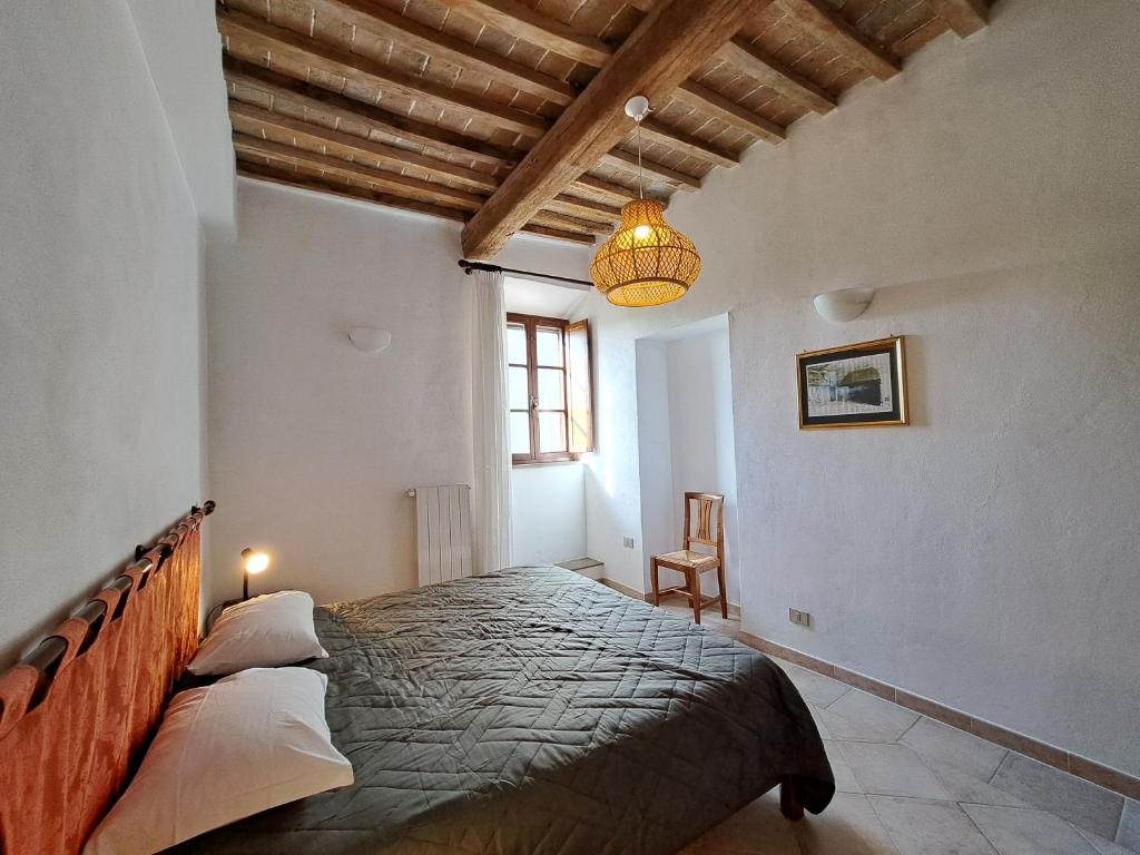 Postel nebo postele na pokoji v ubytování Le Valli Tuscany