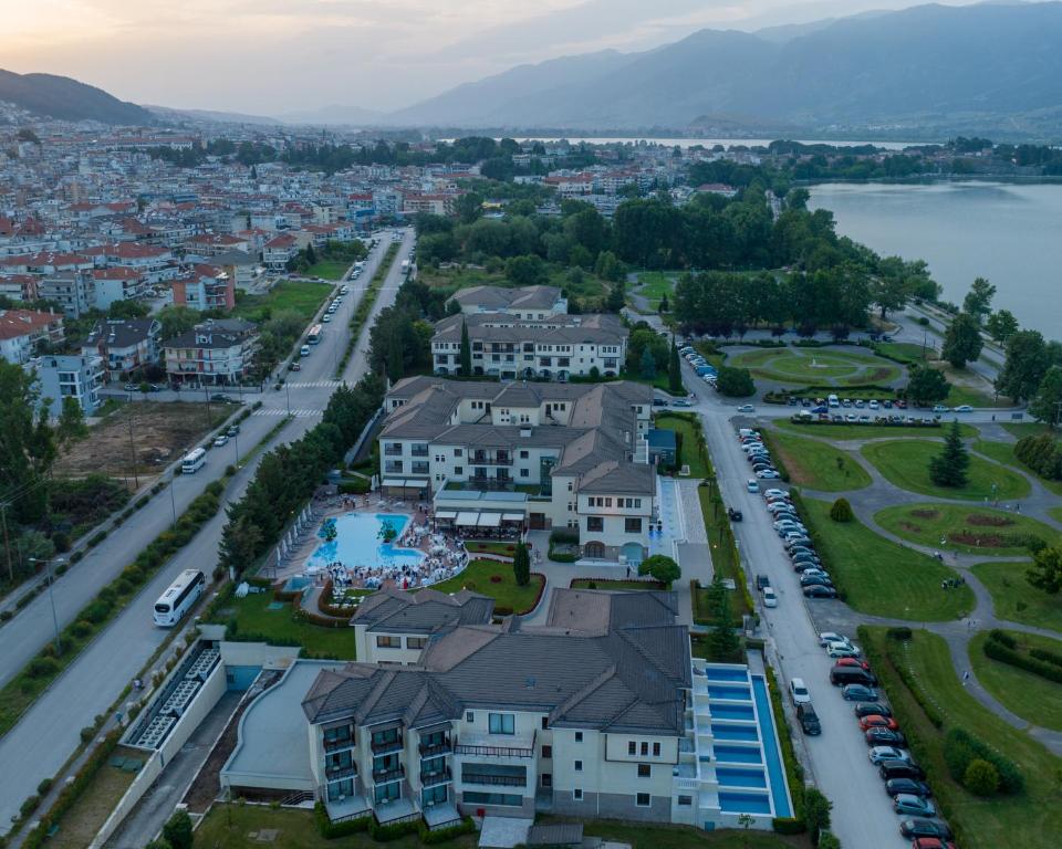 an aerial view of a town with a lake at Hotel Du Lac Congress Center & Spa in Ioannina