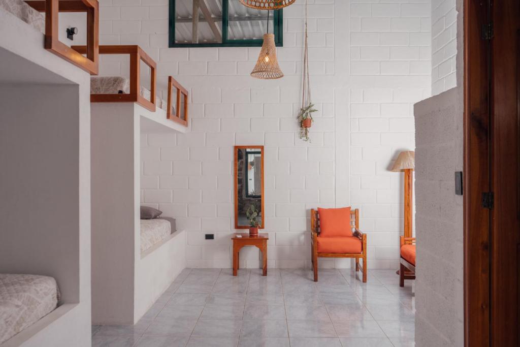 Postel nebo postele na pokoji v ubytování Hostal Pimampiro