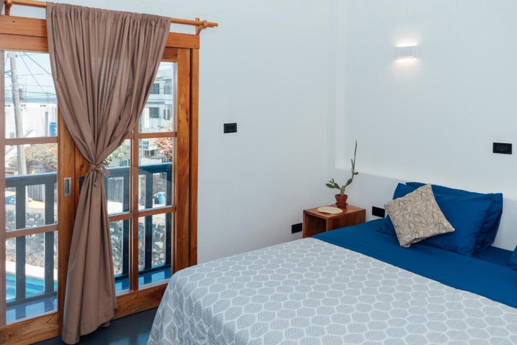 Postel nebo postele na pokoji v ubytování Hotel Pimampiro