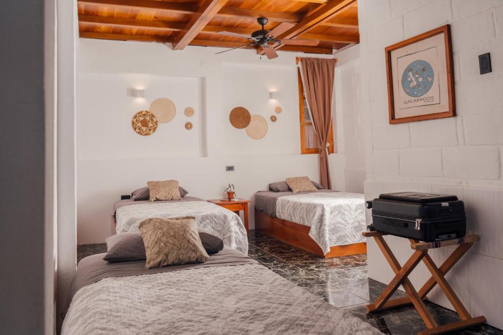 Postel nebo postele na pokoji v ubytování Hotel Pimampiro