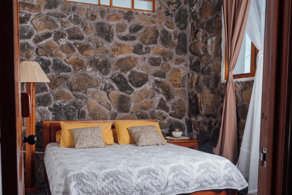 Postel nebo postele na pokoji v ubytování Hotel Pimampiro