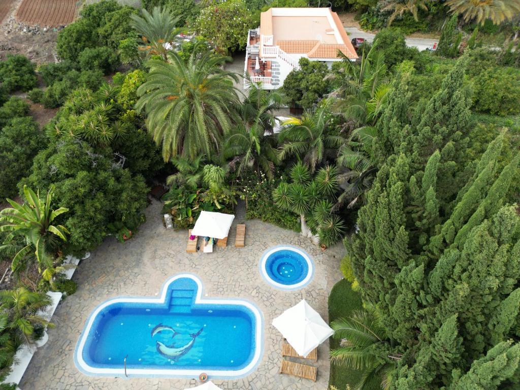 an aerial view of a swimming pool and a resort at Tijarafe 1 in Tijarafe