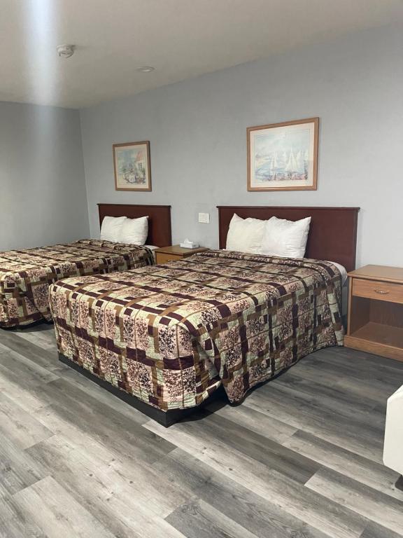 Кровать или кровати в номере San Jacinto Inn