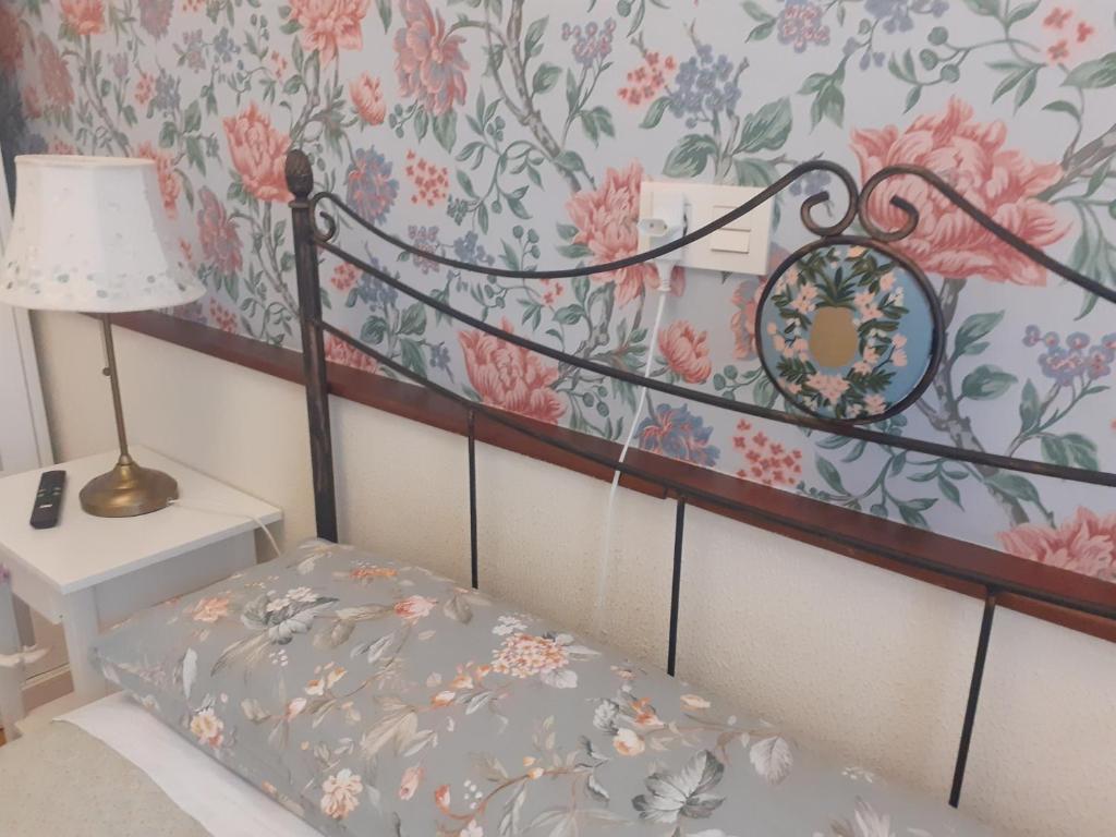 Postel nebo postele na pokoji v ubytování Uría 25 rooms