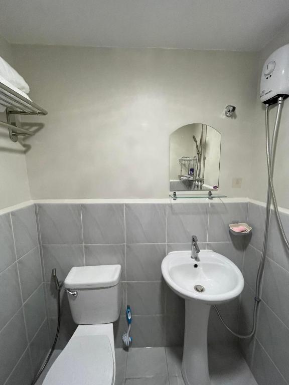 Koupelna v ubytování CKK Condo Unit