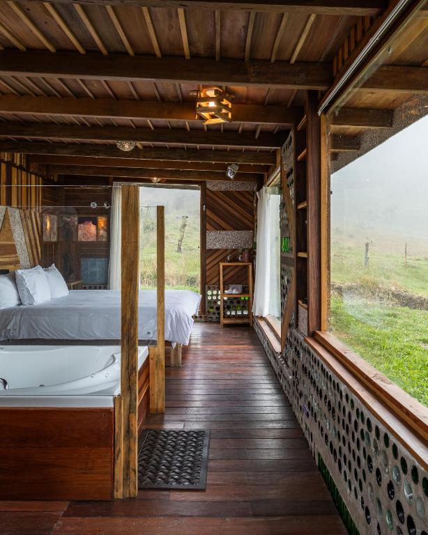 Postel nebo postele na pokoji v ubytování Mamallacta Páramo Lodge