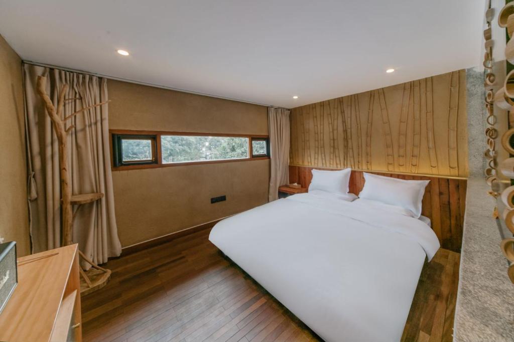 Postel nebo postele na pokoji v ubytování Hangzhou XianQingShan Homestay Westlake