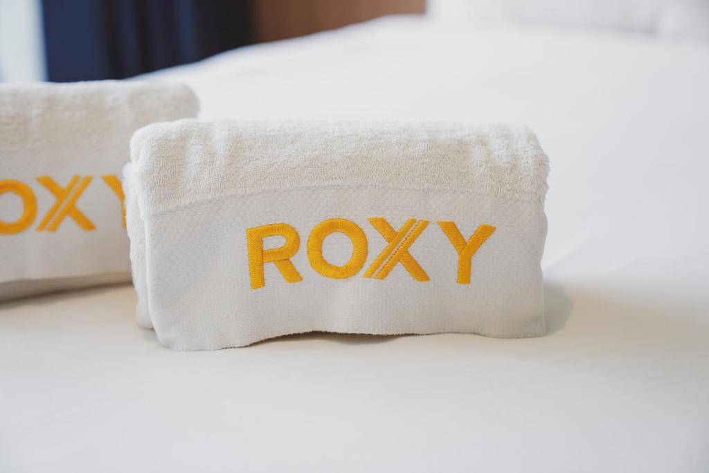 Postel nebo postele na pokoji v ubytování Roxy Beach Apartment