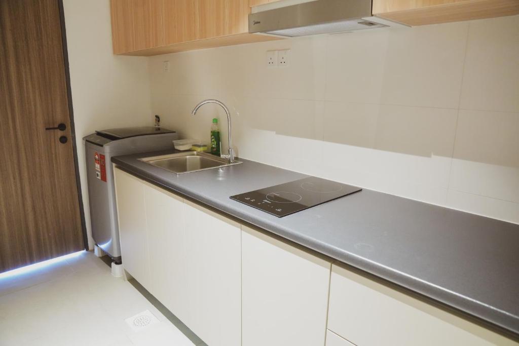 Kuchyň nebo kuchyňský kout v ubytování Roxy Beach Apartment