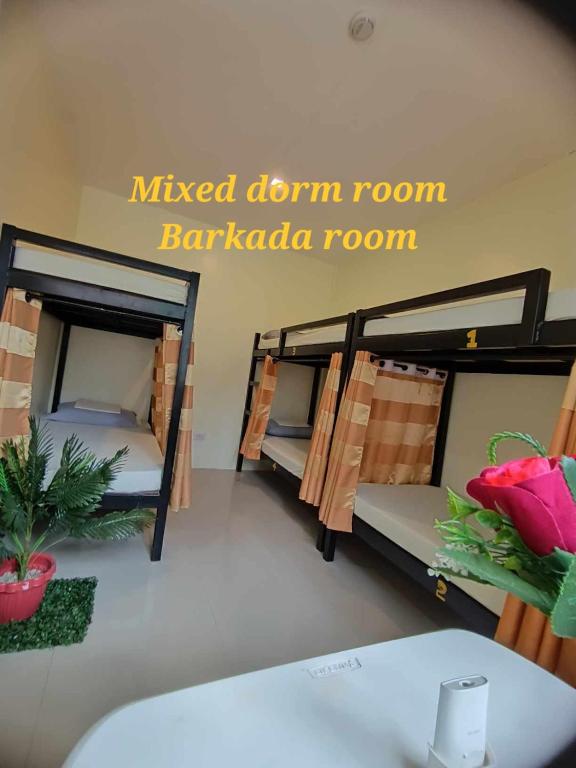 Postel nebo postele na pokoji v ubytování CheRi Backpackers Hostel