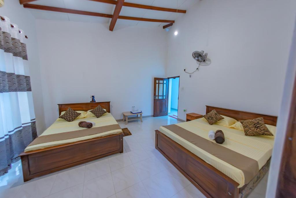 Postel nebo postele na pokoji v ubytování Ciel Grand Villa