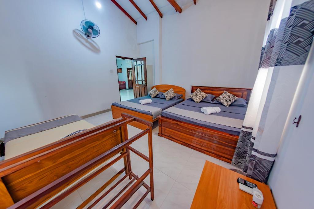 Postel nebo postele na pokoji v ubytování Ciel Grand Villa