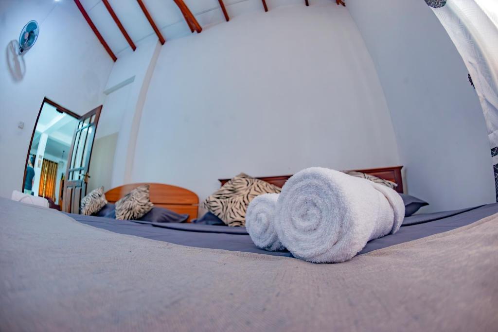 Postel nebo postele na pokoji v ubytování Ciel Grand Villa
