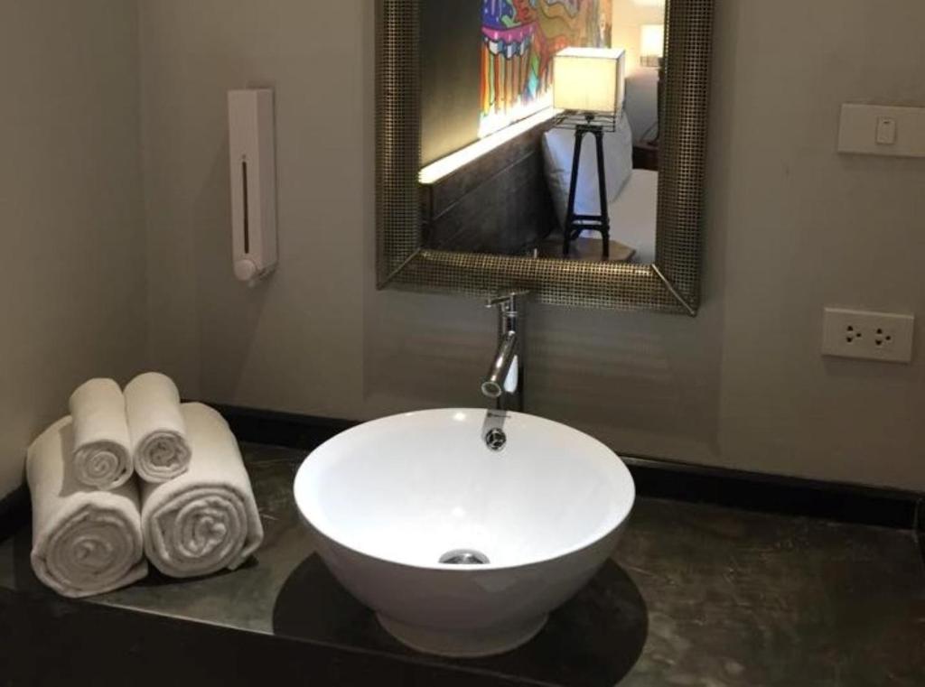 Koupelna v ubytování Cacha Hotel