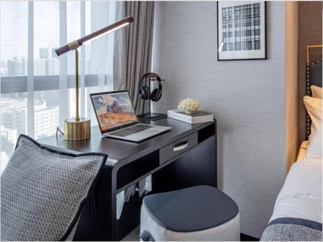 Televisyen dan/atau pusat hiburan di Millenia Executive Apartment Guangzhou East Railway Station Zhujiang New Town Branch - Free Shuttle Bus to Canton Fair Complex During Canton Fair Period