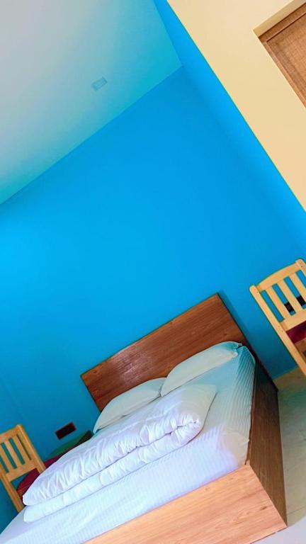 Postel nebo postele na pokoji v ubytování Earth Lounge Resort