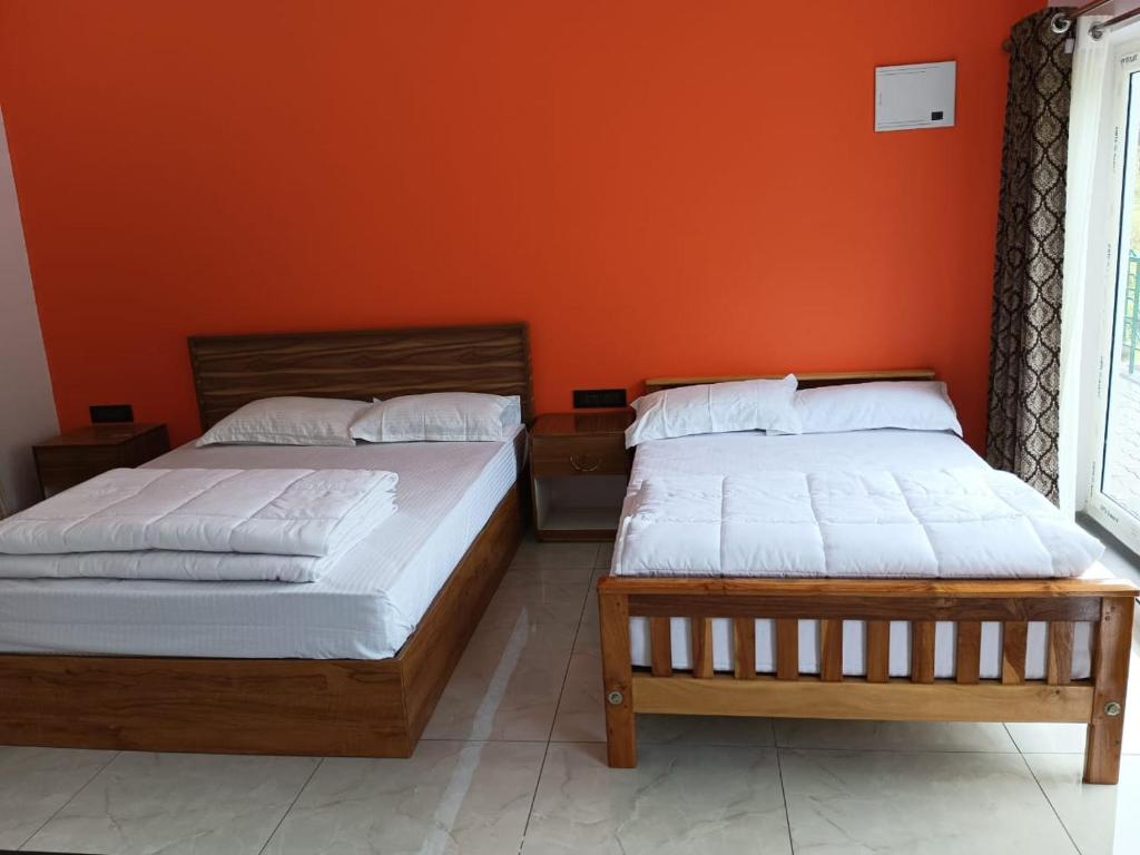 Postel nebo postele na pokoji v ubytování Earth Lounge Resort
