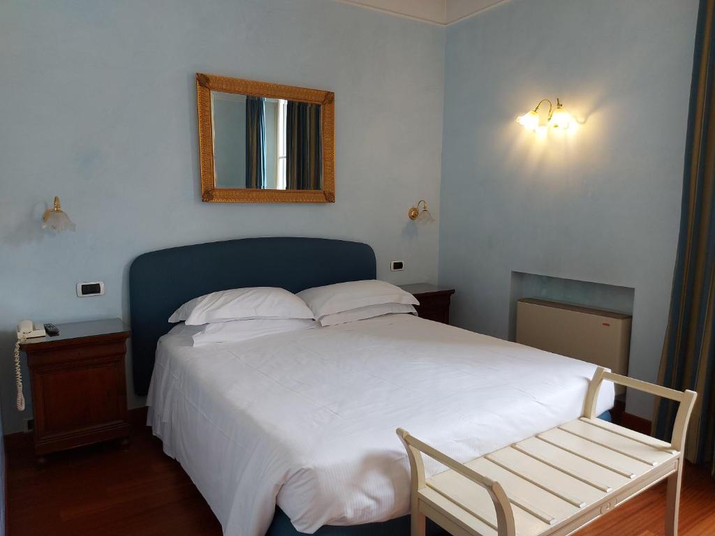 Postel nebo postele na pokoji v ubytování PHI Hotel Canalgrande