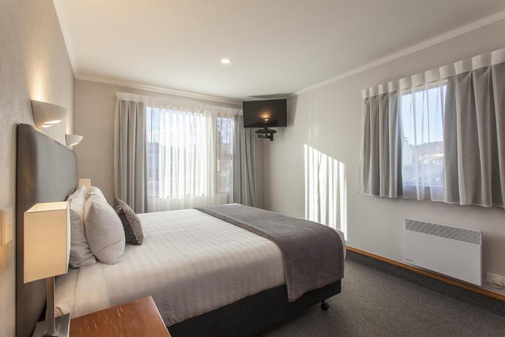 Postel nebo postele na pokoji v ubytování Amross Motel