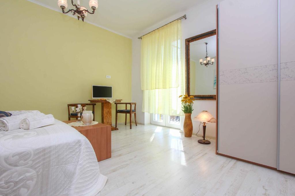 Voodi või voodid majutusasutuse Apartment Jasmin toas