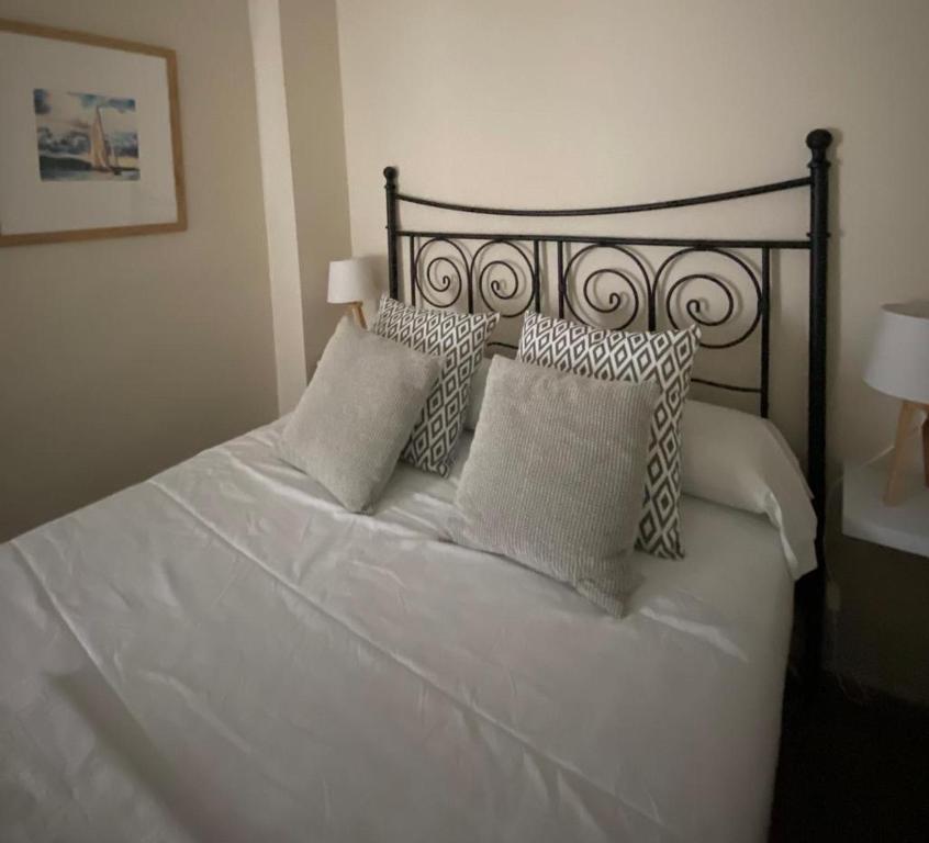 Postel nebo postele na pokoji v ubytování Apartamento Plaza Grande