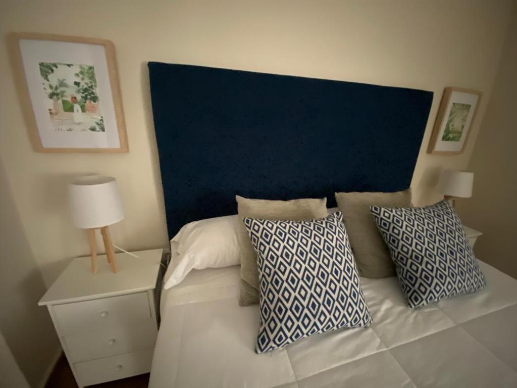 Postel nebo postele na pokoji v ubytování Apartamento Plaza Grande