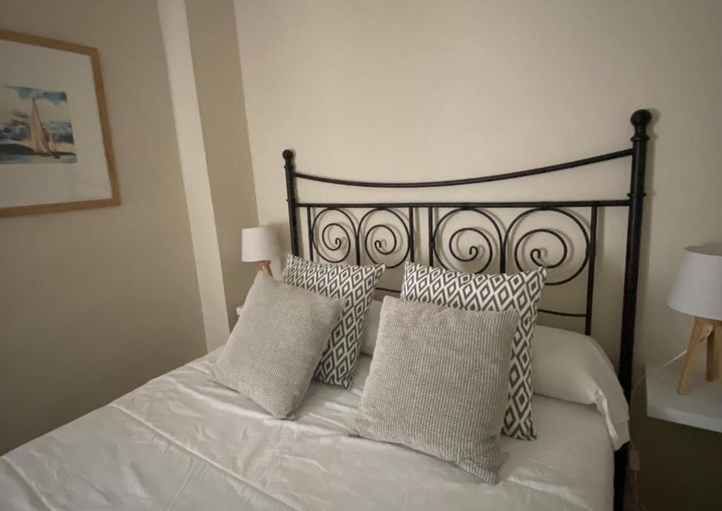 Postel nebo postele na pokoji v ubytování Apartamento Plaza Grande