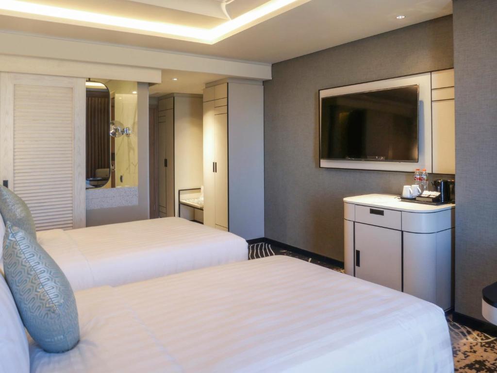 Movenpick Surabaya City - Deluxe Twin Room Met Uitzicht Op De Stad