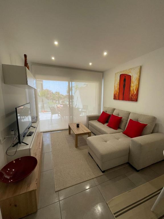 A television and/or entertainment centre at Valentino Golf II Villamartin