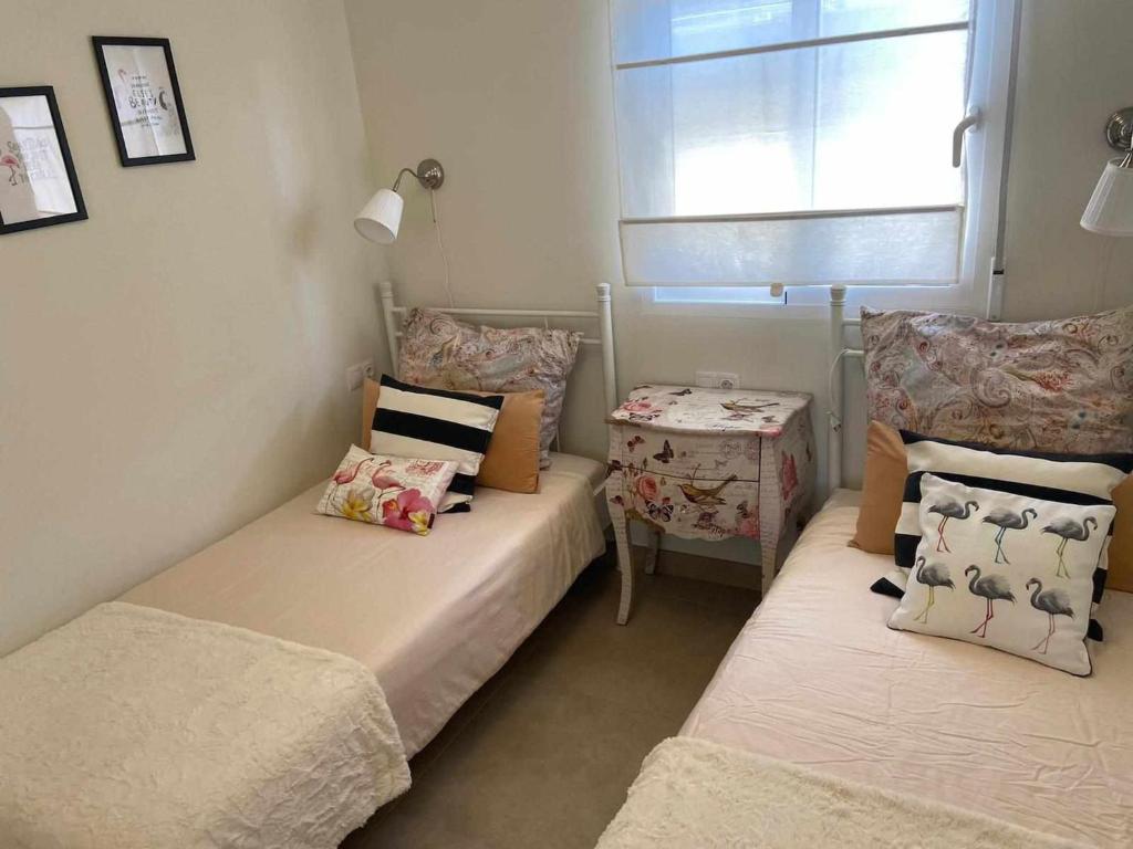 Postel nebo postele na pokoji v ubytování Duplex campoamor heated pool
