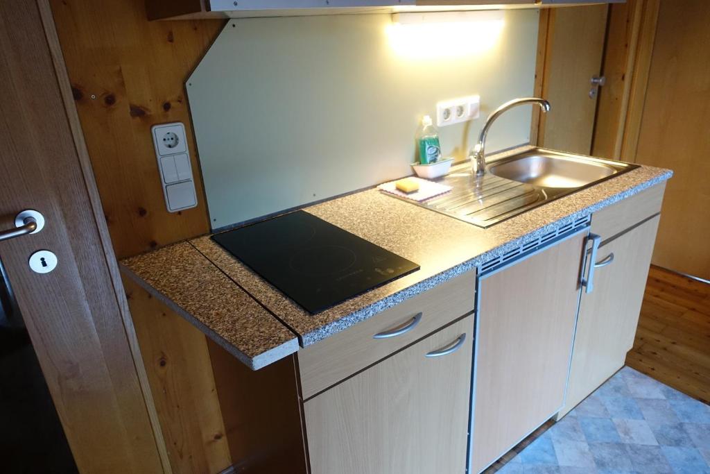 Kuchyň nebo kuchyňský kout v ubytování Apartmentshaus Dual -1