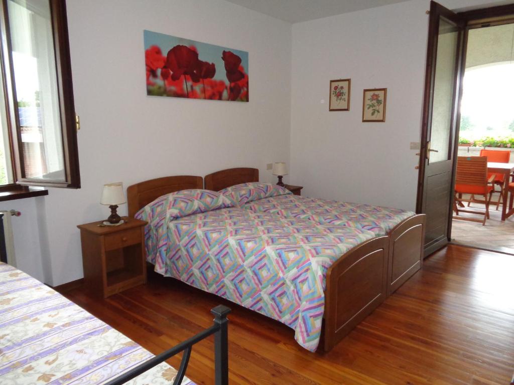 A bed or beds in a room at B&B Casa Perini