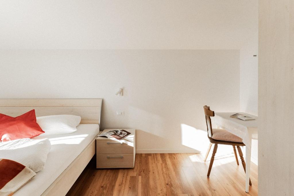 Łóżko lub łóżka w pokoju w obiekcie Apartment Niederhaushof