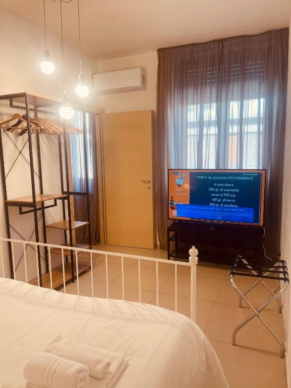 A television and/or entertainment centre at Berga Exclusive Suite 5