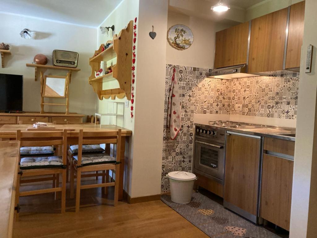 a kitchen with a stove and a counter top at Edelweiss Apt29 in Pretoro