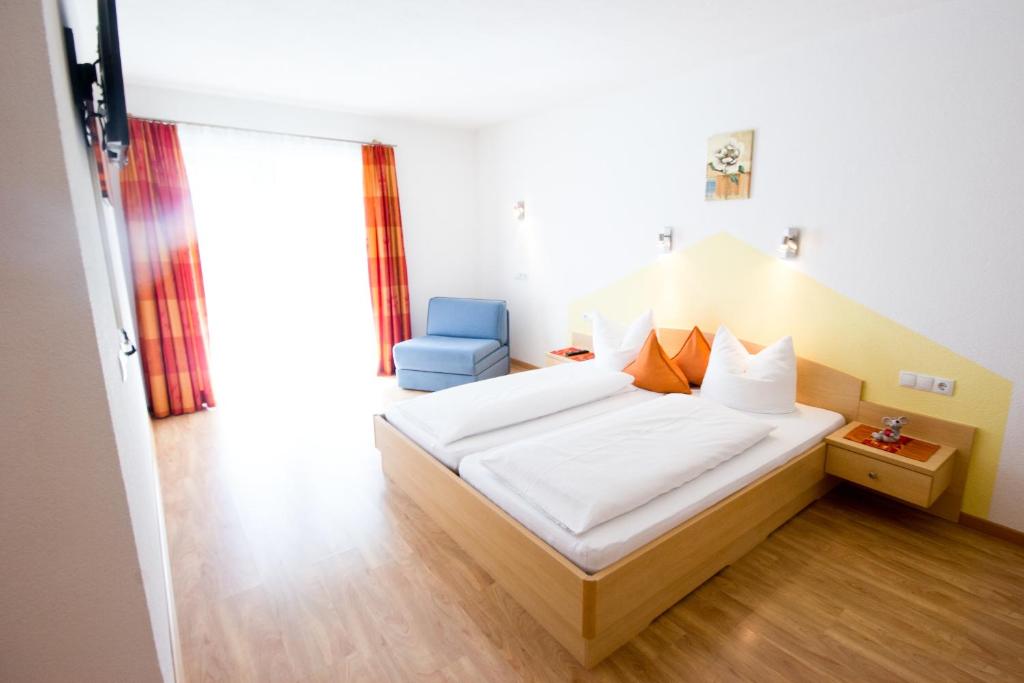 A bed or beds in a room at Apart Bergecho