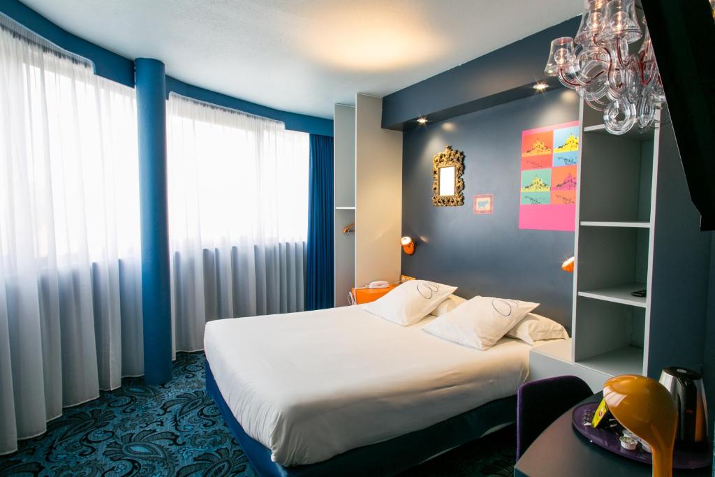 Postel nebo postele na pokoji v ubytování Hotel Gabriel