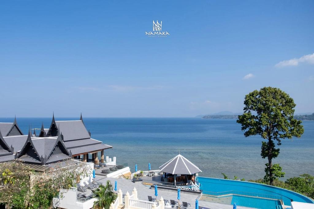 an aerial view of the resort and the ocean at Namaka Resort Kamala in Kamala Beach