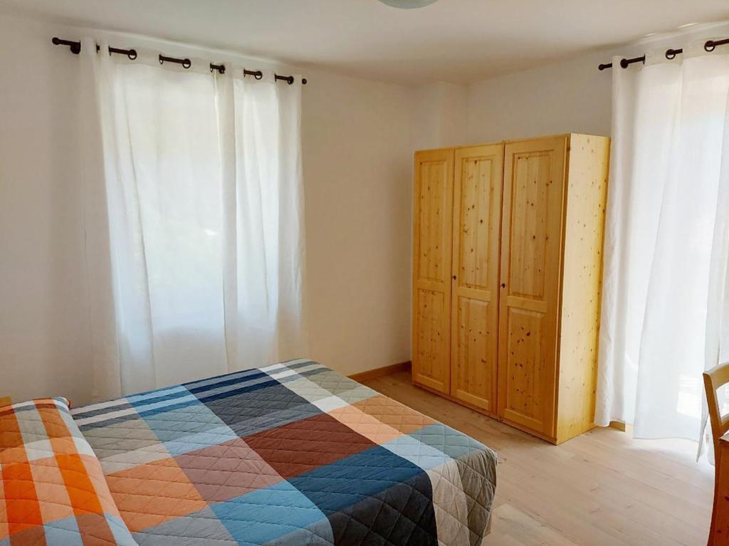 Postel nebo postele na pokoji v ubytování Residenza Arnica